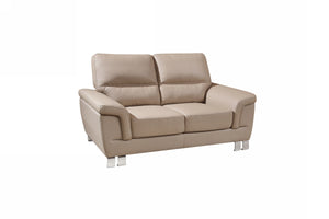 Homeroots 64" Beige And Silver Faux Leather Love Seat   329559