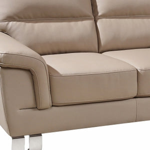 Homeroots 64" Beige And Silver Faux Leather Love Seat   329559