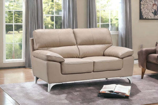 Homeroots 64" Beige And Silver Faux Leather Loveseat   329567