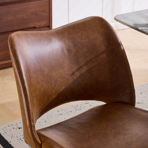 English Elm The Swivel Dining Chair with Hollow Cutout Back Faux Leather Hardwood Frame Modern Brown W3612P436512
