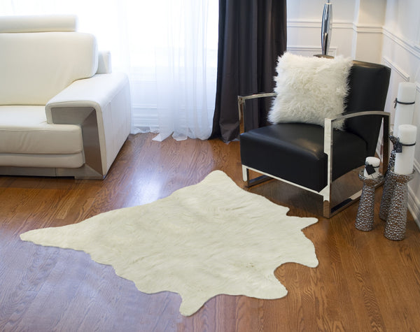 Homeroots 4' X 5' Off White Faux Cowhide Animal Print Cowhide Area Rug  Faux Cowhide 332248