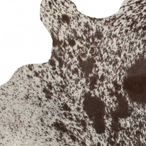 Homeroots 60" X 84" White Chocolate Cowhide  Rug  Cowhide 332275