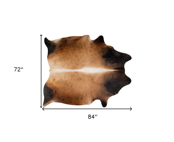 Homeroots 72" X 84" Tan Cowhide  Rug Tan Cowhide 332279