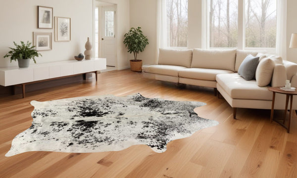 HomeRoots 6' Black and White Cowhide Area Rug - Unique, Durable, and Stylish for Modern Homes and Interiors 332280