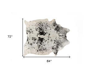 HomeRoots 6' Black and White Cowhide Area Rug - Unique, Durable, and Stylish for Modern Homes and Interiors 332280