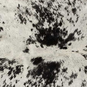 HomeRoots 6' Black and White Cowhide Area Rug - Unique, Durable, and Stylish for Modern Homes and Interiors 332280
