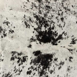HomeRoots 6' Black and White Cowhide Area Rug - Unique, Durable, and Stylish for Modern Homes and Interiors 332280