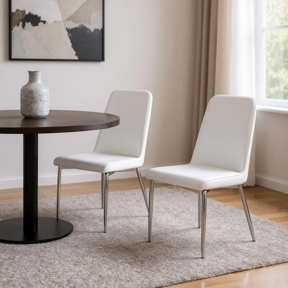 HomeRoots Set of Two Elegant Upholstered Faux Leather Dining Chairs with Sleek Silver Accents for Style White 332575