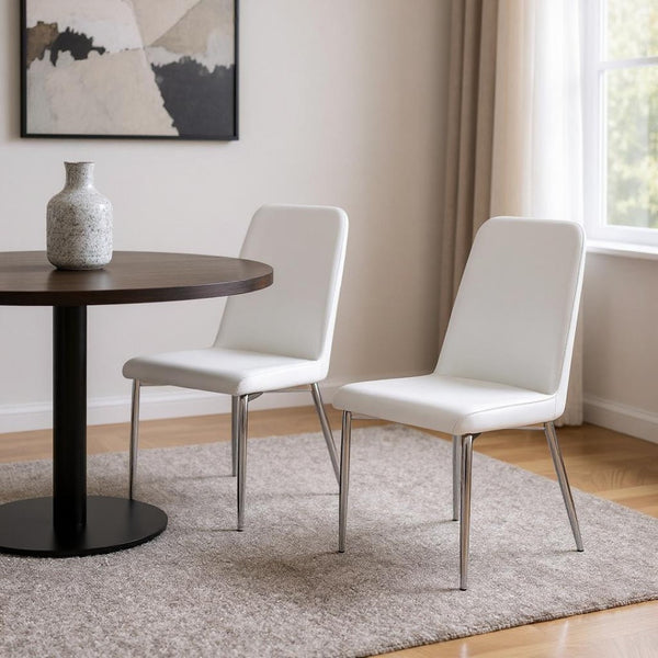 HomeRoots Set of Two Elegant Upholstered Faux Leather Dining Chairs with Sleek Silver Accents for Style White 332575
