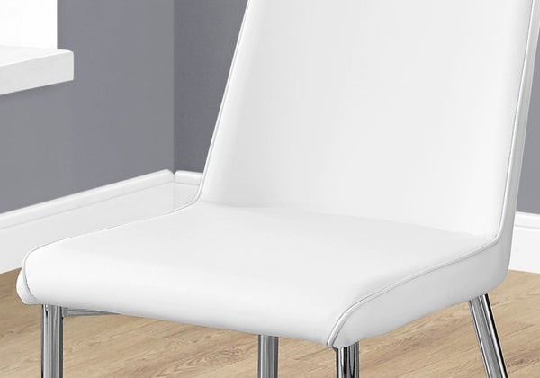 HomeRoots Set of Two Elegant Upholstered Faux Leather Dining Chairs with Sleek Silver Accents for Style White 332575