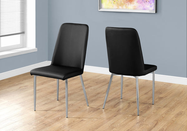 HomeRoots Set of Two Elegant Upholstered Faux Leather Dining Chairs with Sleek Silver Accents for Style Black 332576