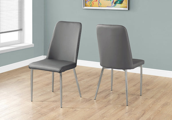 HomeRoots Set of Two Elegant Upholstered Faux Leather Dining Chairs with Sleek Silver Accents for Style Grey 332577