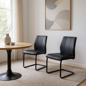 HomeRoots Set of Two Elegant Upholstered Faux Leather Dining Side Chairs with Chrome Finish for Modern Homes Black 332628