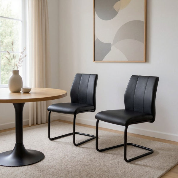 HomeRoots Set of Two Elegant Upholstered Faux Leather Dining Side Chairs with Chrome Finish for Modern Homes Black 332628