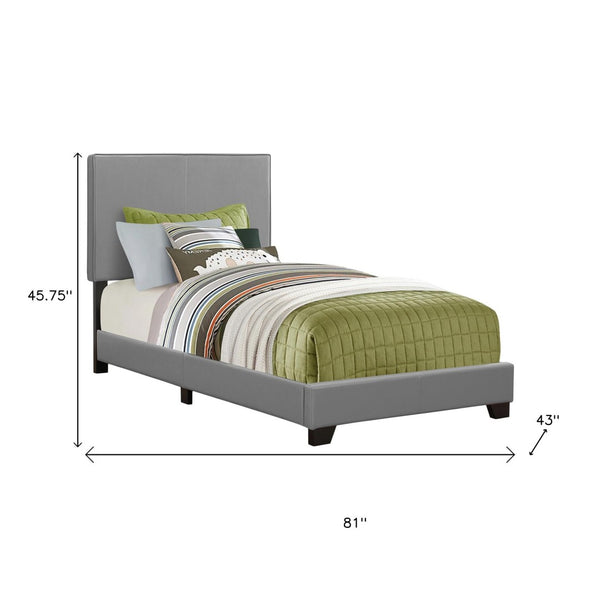 HomeRoots Solid Modern Twin Bed in Gray Faux Leather with Durable Wood Frame for Stylish Comfort and Support 333283