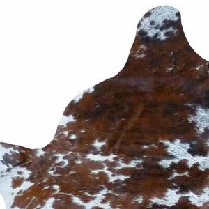 HomeRoots 5' Handmade Cowhide Area Rug - Rustic Elegance for Warmth, Unique Texture, and Style in Any Room Brown and White 334405