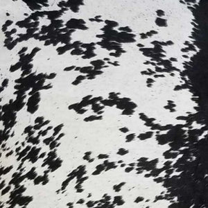 HomeRoots 5' Handmade Cowhide Area Rug - Rustic Elegance for Warmth, Unique Texture, and Style in Any Room Black and White 334415