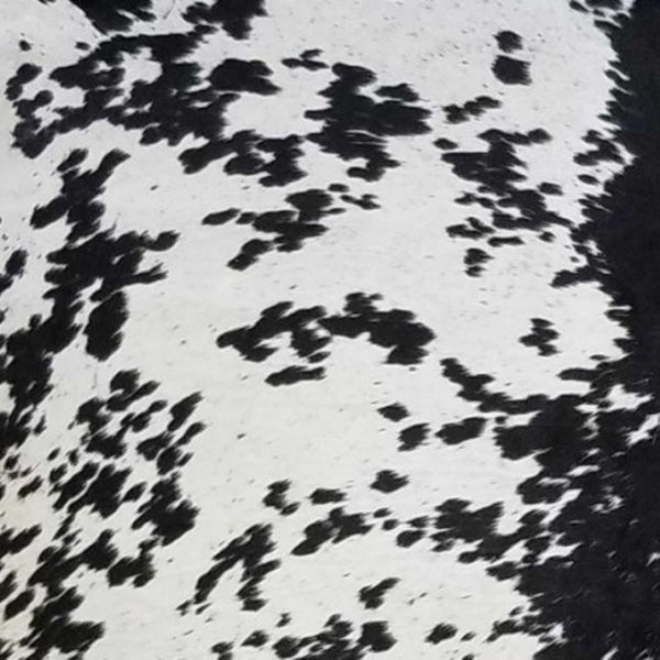 HomeRoots 5' Handmade Cowhide Area Rug - Rustic Elegance for Warmth, Unique Texture, and Style in Any Room Black and White 334415