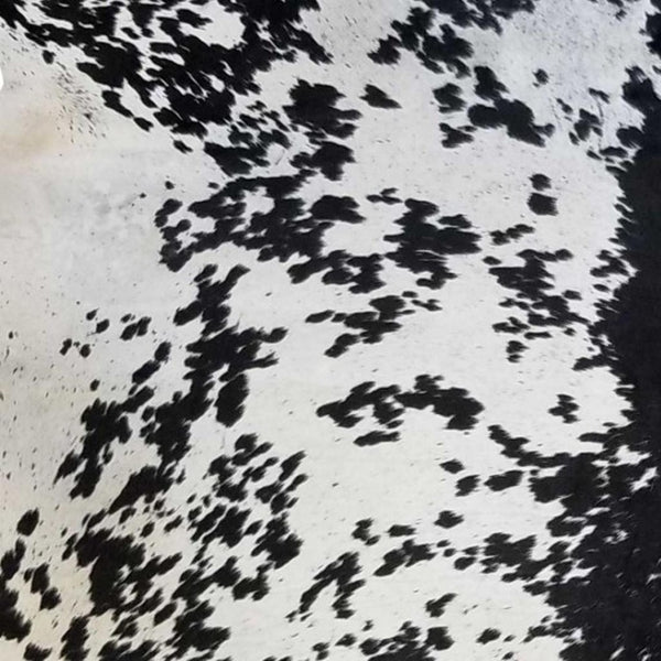 HomeRoots 5' Handmade Cowhide Area Rug - Rustic Elegance for Warmth, Unique Texture, and Style in Any Room Black and White 334415