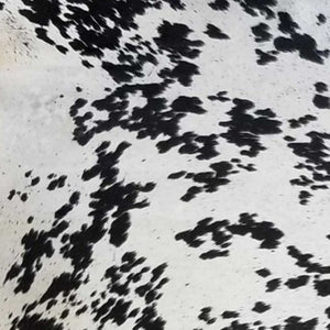 HomeRoots 5' Handmade Cowhide Area Rug - Rustic Elegance for Warmth, Unique Texture, and Style in Any Room Black and White 334415