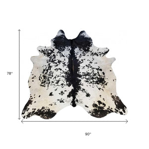HomeRoots 6' Handmade Cowhide Area Rug - Rustic Elegance, Unique Texture, Durable Design for Any Space Black and White 334417