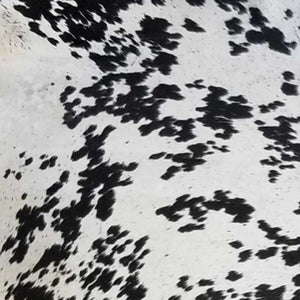 HomeRoots 6' Handmade Cowhide Area Rug - Rustic Elegance, Unique Texture, Durable Design for Any Space Black and White 334417