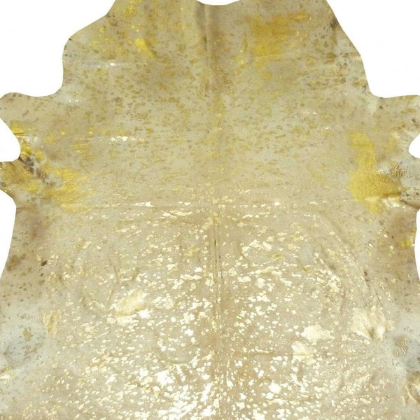 HomeRoots 6' Handmade Cowhide Area Rug - Rustic Elegance, Unique Texture, Durable Design for Any Space Gold Devore 334419