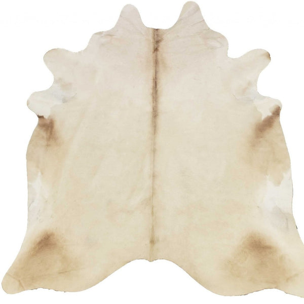 HomeRoots 6' Handmade Cowhide Area Rug - Rustic Elegance, Unique Texture, Durable Design for Any Space Champagne 334424