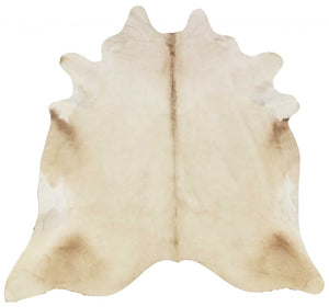 HomeRoots 6' Handmade Cowhide Area Rug - Rustic Elegance, Unique Texture, Durable Design for Any Space Champagne 334424