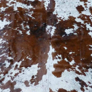 Homeroots 6.5 Ft  Brown And White Brindled Cowhide Rug Brown And White Cowhide 334426