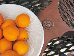 Lexington Tommy Bahama Outdoor 3420-870c Elegant Round Dining Table With Artisan Finish, White Sintered Stone Top & Woven Leather Medium Brown Wood 3420-870c