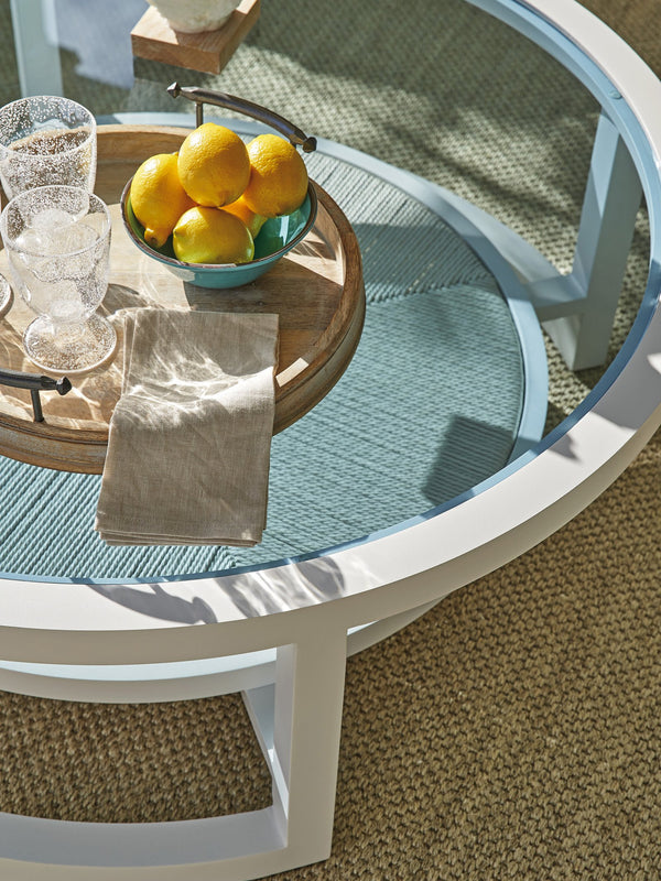 Lexington Tommy Bahama Outdoor 3460-943 Round Cocktail Table - Ocean Breeze Elegance With Marine Blue Glass Top & Woven Shelf Design White Wood 3460-943