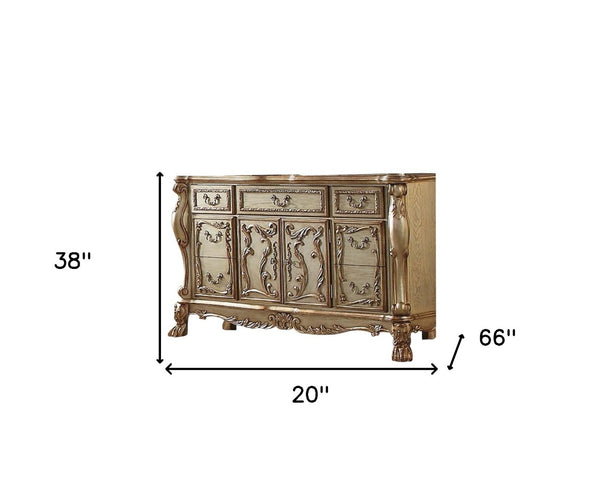 HomeRoots 66" Gold Solid Wood Carved Sideboard - Luxurious Storage with Seven Drawers & Two Doors for Elegance 347057