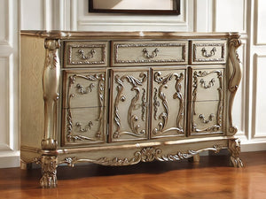 HomeRoots 66" Gold Solid Wood Carved Sideboard - Luxurious Storage with Seven Drawers & Two Doors for Elegance 347057