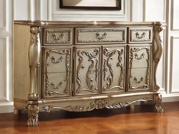 HomeRoots 66" Gold Solid Wood Carved Sideboard - Luxurious Storage with Seven Drawers & Two Doors for Elegance 347057