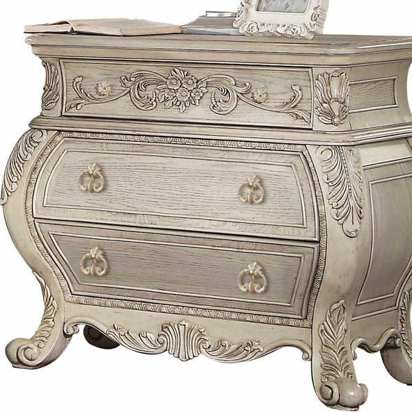 Homeroots 34" Antiqued White Three Drawers Solid Wood Nightstand Antique White  347133