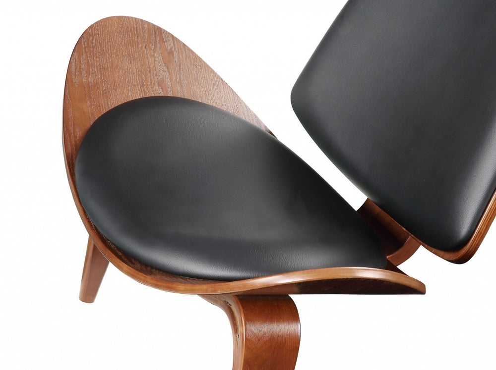 HomeRoots 30" Stylish Black Faux Leather Side Chair with Brown Wooden Legs for Modern Living Spaces & Comfort 347298
