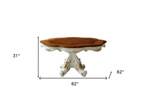 Homeroots 62" Brown And White Oval Solid Wood Pedestal Base Dining Table   347324