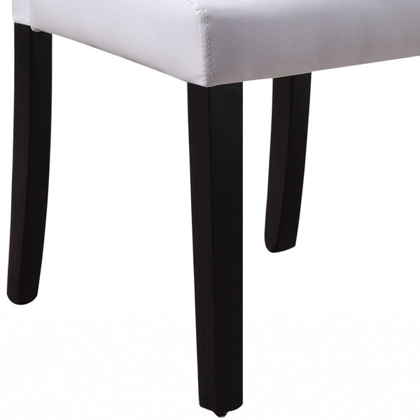 HomeRoots Set of Two Stylish White and Black Upholstered Faux Leather Dining Chairs for Modern Spaces 347335