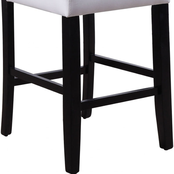 HomeRoots Set of Two Stylish White and Black Faux Leather Counter Height Bar Chairs for Modern Spaces 347337