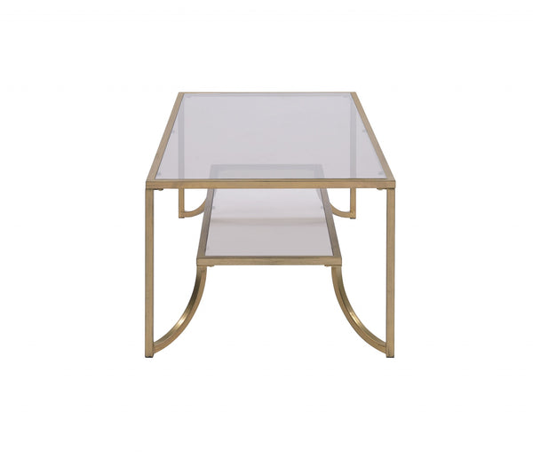 Homeroots 24" X 48" X 18" Antique Gold Smoky Glass Metal Coffee Table   347397