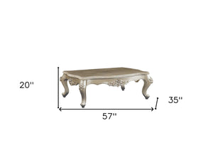 HomeRoots 57" Beige Marble & Solid Wood Coffee Table - Timeless Queen Anne Design for Elegant Living Spaces Champagne 347409