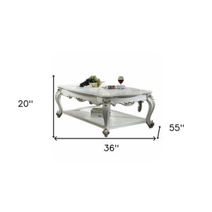 Homeroots 36" X 55" X 20" Antique Pearl Wood Poly-resin Coffee Table Antique Pearl  347444