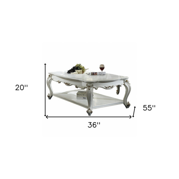 Homeroots 36" X 55" X 20" Antique Pearl Wood Poly-resin Coffee Table Antique Pearl  347444