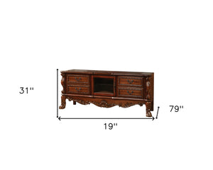 HomeRoots 21" Elegant Wood and Glass TV Console with Classic Scrollwork and Ample Storage for Any Space Cherry Oak 347488