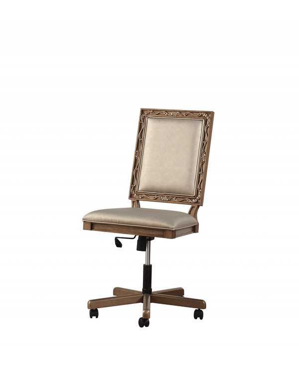 Homeroots 24" X 22" X 41" Champagne Faux Leather Upholstered (Seat) And Antique Gold Wood  Executive Office Chair  Wood 347490