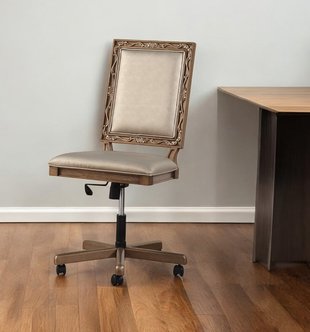 Homeroots 24" X 22" X 41" Champagne Faux Leather Upholstered (Seat) And Antique Gold Wood  Executive Office Chair  Wood 347490