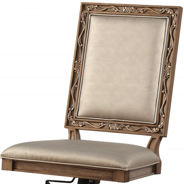 Homeroots 24" X 22" X 41" Champagne Faux Leather Upholstered (Seat) And Antique Gold Wood  Executive Office Chair  Wood 347490