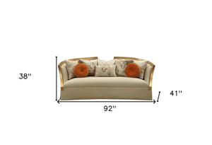 Homeroots 41" Beige Velvet Curved Sofa And Toss Pillows With Natural Legs   348220