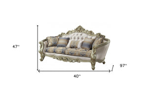 Homeroots 40" Antiqued White Velvet Curved Floral Sofa And Toss Pillows With Champagne Legs   348231